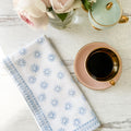 Here Comes the Sun Napkins in Light Blue - set of 4