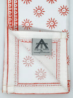 Here Comes the Sun Tablecloth in Cardinal Red